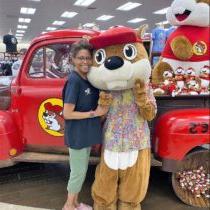 4. Buc-ee’s mascot, a buck-toothed beaver (after the “Beaver” founder) poses with a patron.